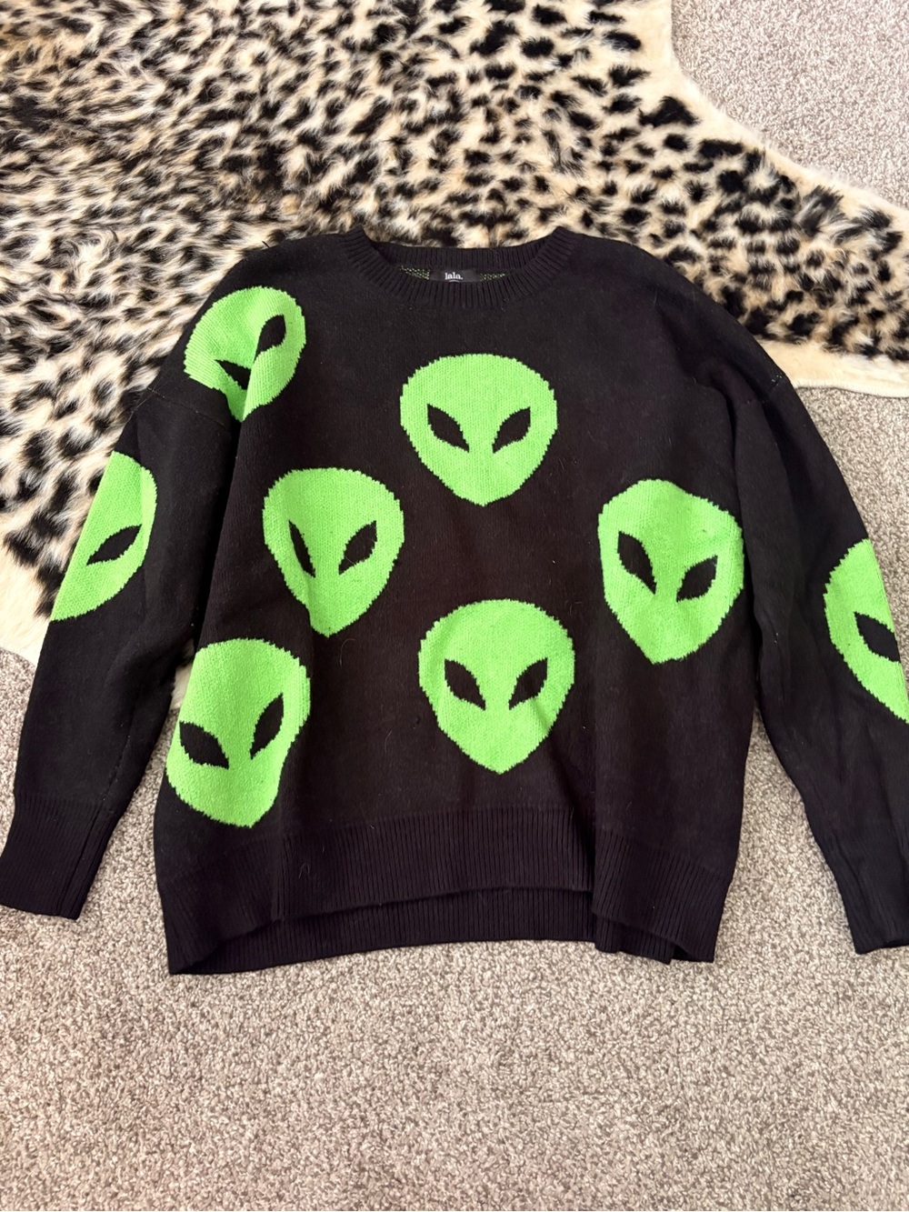 Black Sweater with Neon Green Alien Face Pattern